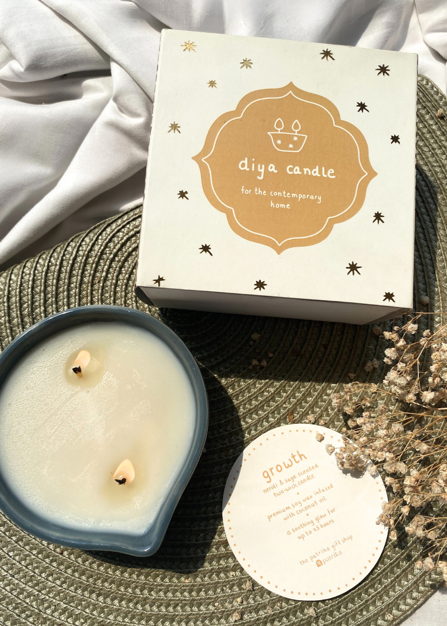 growth diya candle